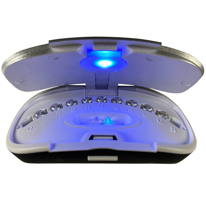 Open CZ Master Set Pro 2 1.00CT Stone Set in its organizing case, showing stones under a blue light