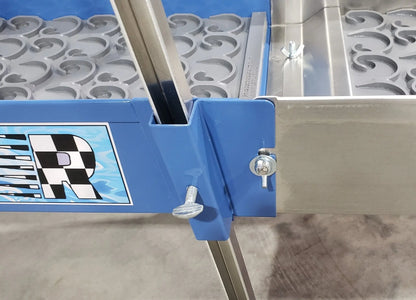 Close-up of 12x38 Speed Banker Extension with Dream Mat showing blue frame and silver adjustment hardware