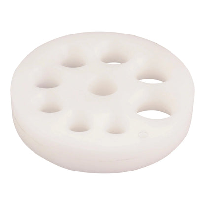Top view of a white ring stretcher die showing multiple circular openings on a white background