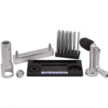 Front view of a disc cutting kit showcasing multiple metal forming tools on a white background