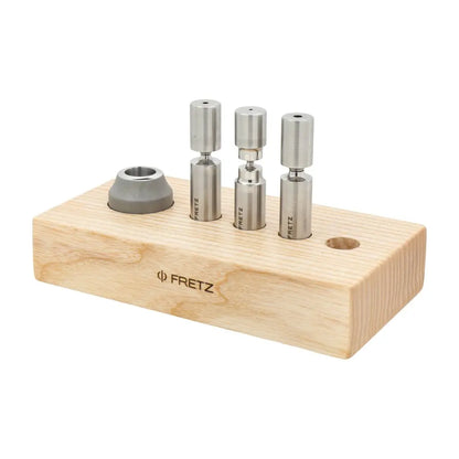 Three-quarter view of FRETZ Tube Flaring Tool Kit for Bead Spacers showcasing metal tools in a wooden holder