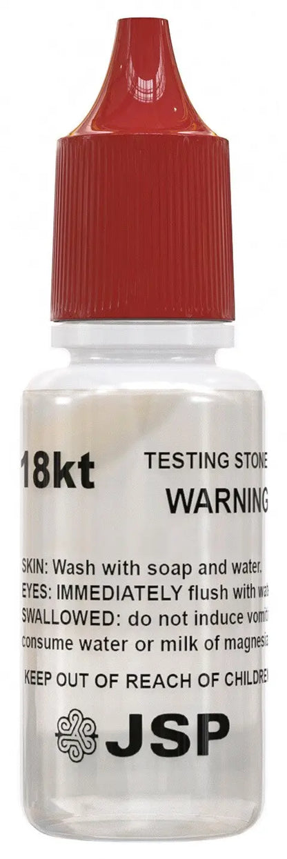 Close-up of 18kt testing solution bottle from a gold, silver, and platinum testing kit with red cap on white background