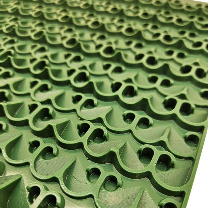 Close-up of 4X Mat Turbocharge Kit for Gold Cube showcasing green raised riffles and capture holes