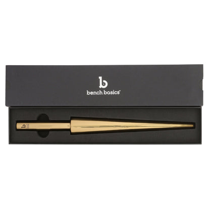 Front view of gold oval forming mandrel showcasing a tapered shaping surface in a black presentation box