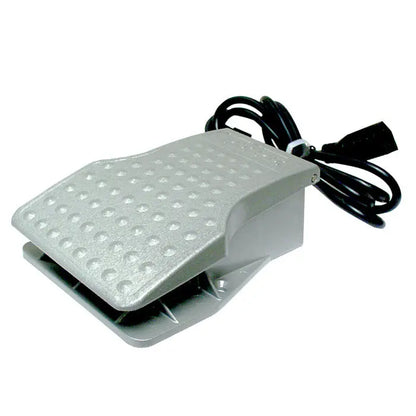 Angled view of Pepetools aluminum flexshaft foot pedal speed control with textured pedal and attached cord on white background
