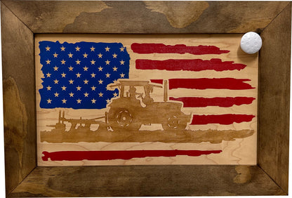 Front view of wall-mounted locking gun cabinet showcasing American flag and farmer artwork with wooden frame