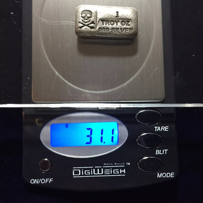 Close-up of the Ultimate Gold, Silver & Platinum Testing Kit showing a 999 silver bar weighing 31.1 grams on a digital scale