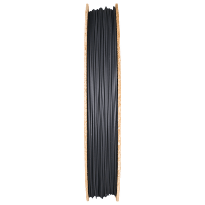Side view of Rapid 3DShield boron carbide filament spool showcasing black filament with a transparent background