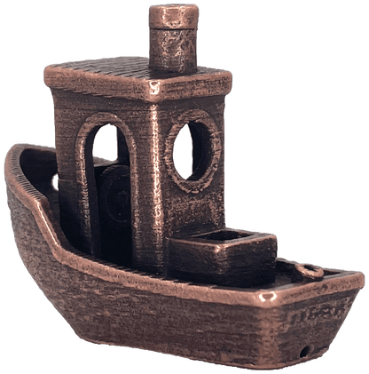 A textured bronze-colored metallic 3D-printed Benchy tugboat figurine.