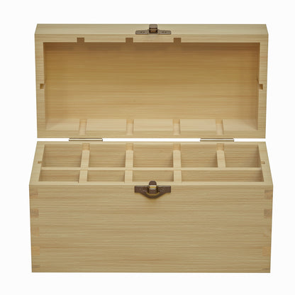 Open view of the jewelry testing kit storage box showcasing divided compartments and brass latches on white background
