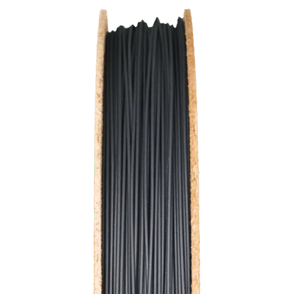 Front view of Rapid 3DShield Boron Carbide Filament showcasing black filament wound on a partial spool with a transparent background