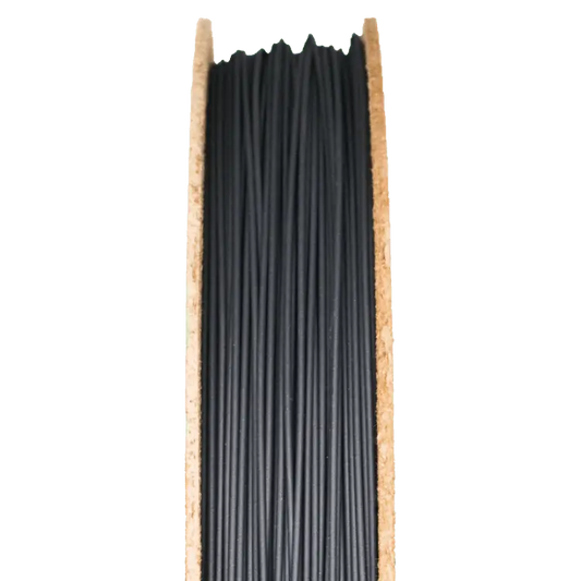 Front view of Rapid 3DShield Boron Carbide Filament showcasing black filament wound on a partial spool with a transparent background
