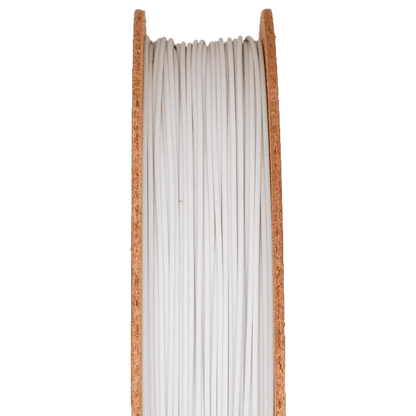 Front view of Pyrex Borosilicate Glass Filamet spool showcasing white glass filament with cork sides on a dark background