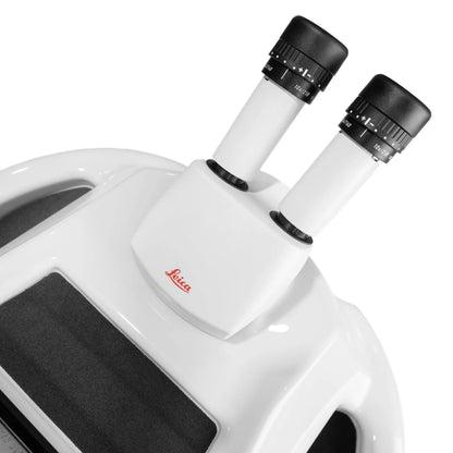 Close-up of Tauweld 225J benchtop laser welder showing the binocular microscope viewer in a white product photo