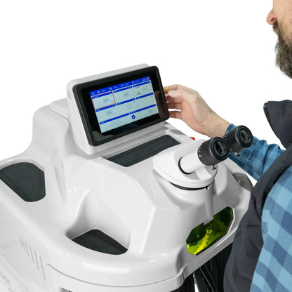 Front view of Tauweld 225J benchtop laser welder showcasing touchscreen controls and binocular microscope on white background