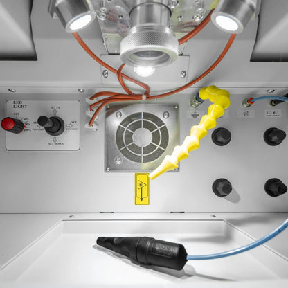 Interior view of Tauweld 225J Benchtop Laser Welder showcasing inspection lights, control panel, and ventilation fan