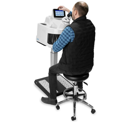 Rear view of Tauweld 225J benchtop laser welder with touchscreen, operator, and white background