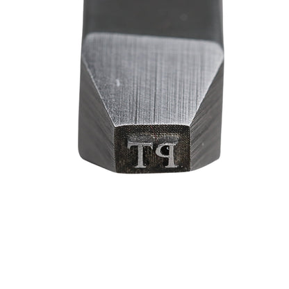 Close-up of a hardened steel jewelers metal stamp showing a reversed PT hallmarking mark on a white background