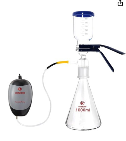 Glass vacuum filtration set with a 1000ml Erlenmeyer flask, funnel, blue clamp, and a black/gray CHSZCHC vacuum pump.