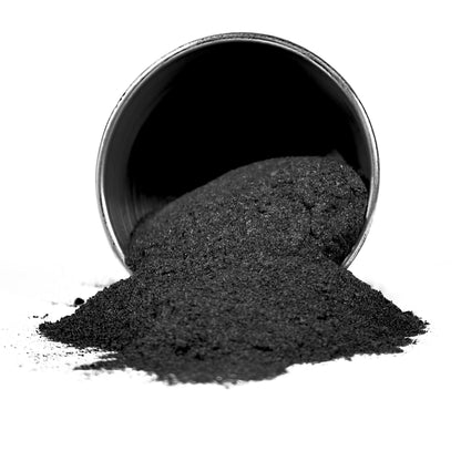 Front view of Stainless Steel 17-4 Filamet Print and Sinter Kit with dark granular material spilling from a metal container