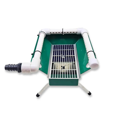 Top view of 4X16 Micro Banker Kit with Pump and Dream Mat showing green sluice box, grate, and PVC pipes on white background