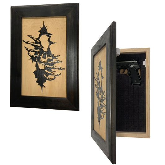 Wooden wall-mounted concealment case with a dark frame, skull artwork, and a handgun stored inside.