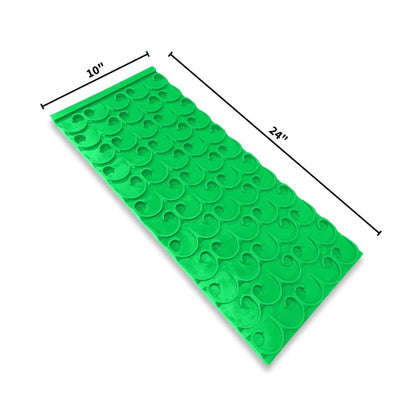 Angled view of 10 by 24 inch Sluice Mat showcasing a raised vortex pattern with measurement markings on a white background