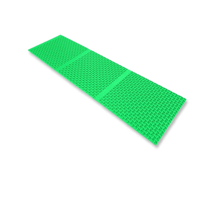 Angled view of 10X36 Sluice Mat - Micro Dream Mat showcasing textured raised riffles with a white background