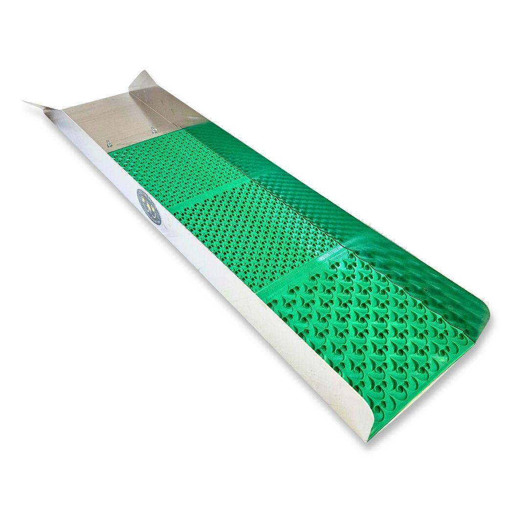 Aluminum gold sluice box with green rubber riffle mat featuring varying patterns.