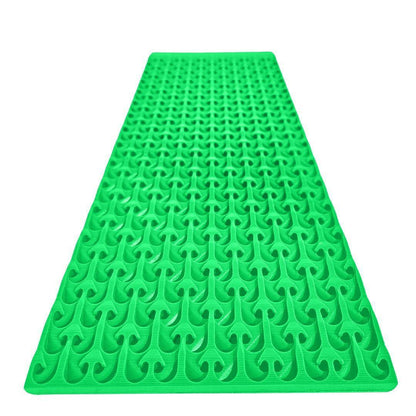 Front angled view of 6X16 Micro Sluice Mat 2nd Gen showcasing its green textured riffle pattern on a white background