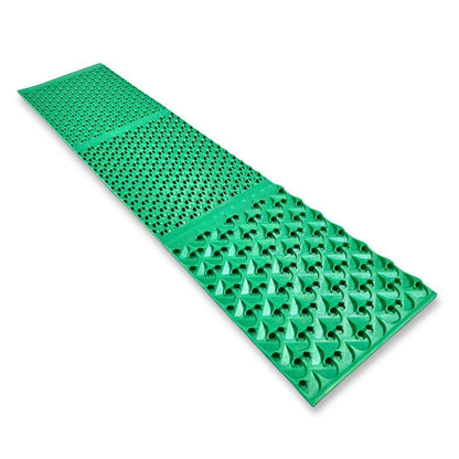 Bright green plastic gold panning sluice box mat with varied riffle patterns.