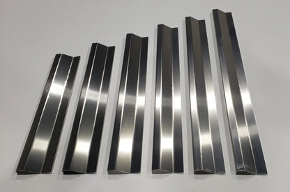 Top view of clamps for Vortex Dream Mat and Dredge Mat showcasing six metal channels on a light background