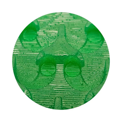 Close-up of The Boss Micro-Dredge clean-up sluice box kit showcasing green riffle mat texture with a white background