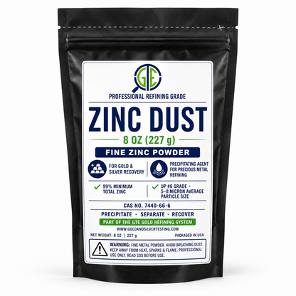 Black foil pouch of Zinc Dust, 8 oz, for gold and silver recovery, with a white and blue label.