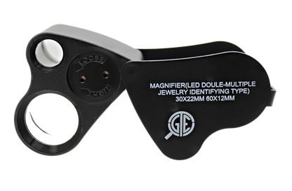 Open view of the 30x and 60x LED eye loupe magnifier included in the gold and silver jewelry acid test kit