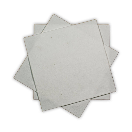 Front view of Kiln Paper showcasing overlapping square sheets on a white background