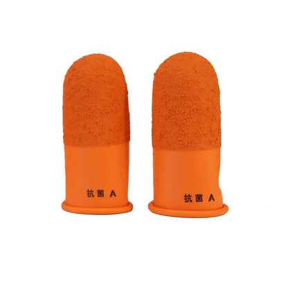 Front view of a pair of Japanese rubber finger guards showcasing textured orange tips and flared bases on a white background