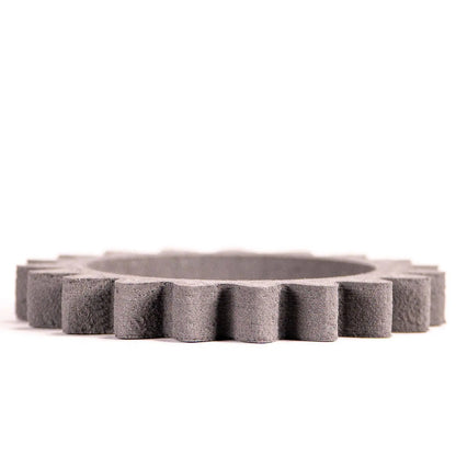Front view of Stainless Steel 17-4 Filamet showcasing a circular toothed ring sample on a white background