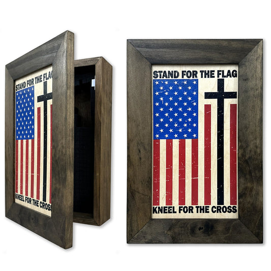 Wooden wall safe with distressed American flag face, black cross, and text: "STAND FOR THE FLAG KNEEL FOR THE CROSS".