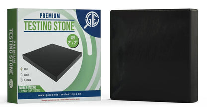 Front view of PuriTEST 2x2 Acid Test Stone showcasing its black testing surface with product packaging on a white background