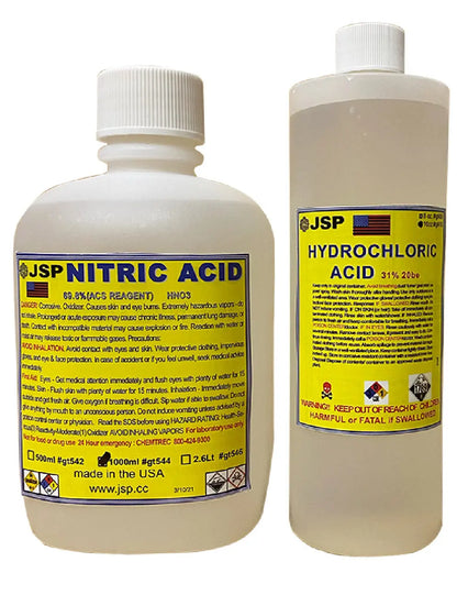 nitric acid and hydrochloric acid bottles used for gold refining and precious metal testing