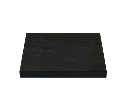 Black scratch stone tester from the PuriTEST gold and silver jewelry acid testing kit on a white background