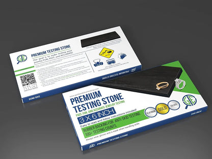 Angled view of a premium 3 x 6 inch testing stone with rubber backing on branded packaging against a gray background