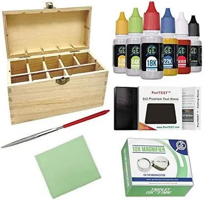 Open wooden precious metal testing kit showcasing acid bottles, test stone, file, cloth, and 10X loupe on white