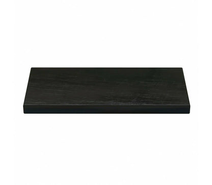 Angled view of a large 3 by 6 scratch stone from the PuriTEST acid testing kit on a white background