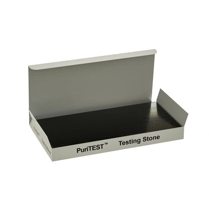 Front view of a PuriTEST testing stone in an open white cardboard tray on a white background