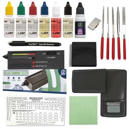 Top view of gold, silver, and platinum testing kit with acid bottles, digital scale, diamond tester, files, and magnet