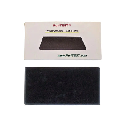 Front view of a PuriTEST Premium 3x6 Test Stone showcasing its black rectangular surface with product packaging